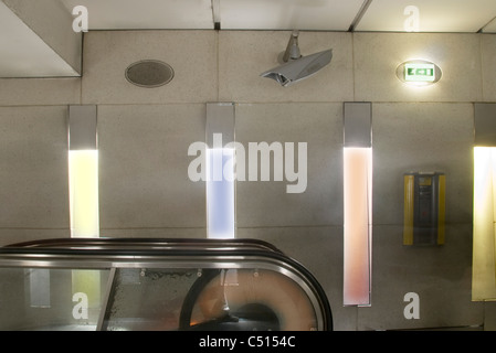 Escalator, lighting fixtures on wall Stock Photo