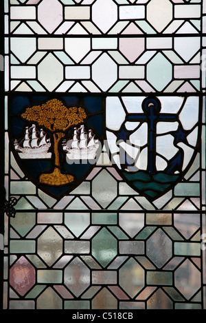 Stained glass window with coats of arms Stock Photo