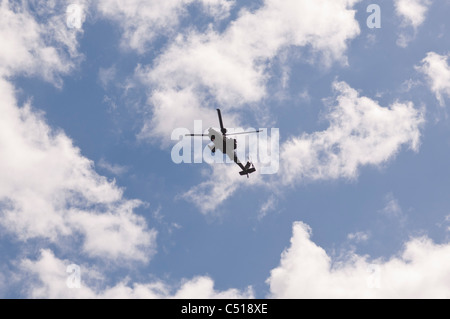 An Apache helicopter flying in the Uk Stock Photo