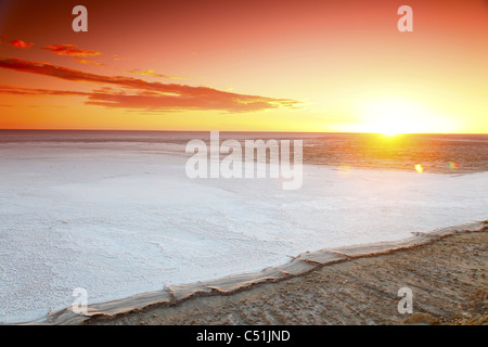 Africa, Tunisia, Chott El Jerid, Flat Dry Salt Lake between Tozeur and Kebili, Sunset Stock Photo