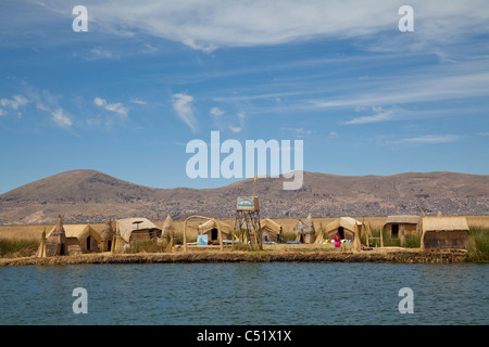 Traditional houses on the Uros Islands, Lake Titicaca, Peru Stock Photo