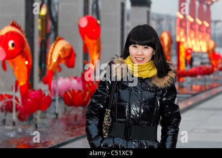 Street Portrait of a Young Asian Woman, Xian, Shaanxi, China Stock Photo