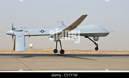 An MQ-1B Predator drone takes off from Balad Air Base, Iraq. Stock Photo