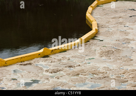 turbidity fence on waterway Stock Photo