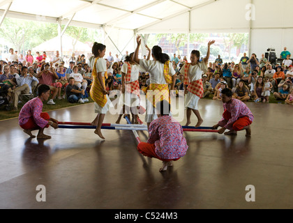 Tinikling (Philippine folk dance) performers on stage - Smithsonian ...