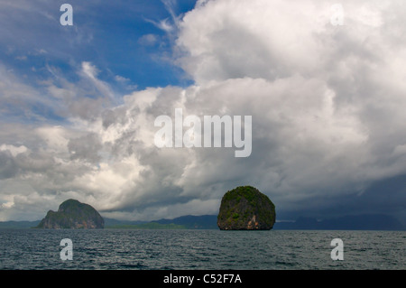 Thick Thunderstorm Clouds Moving over the Sea Stock Photo