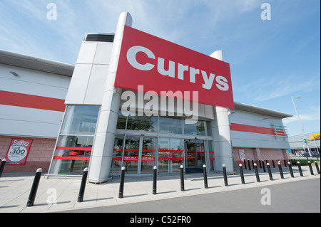 The storefront of the electrical retailer Currys on a retail park, Manchester. (Editorial use only). Stock Photo