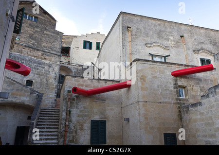 MUSMA art gallery housed in caves of the UNESCO site, the Sasso Caveoso of Matera. External architectural art. Stock Photo