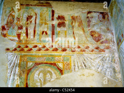 Corhampton, Hampshire, 13th century wall painting, scenes from life of St. Swithun, Bishop of Winchester, woman breaking eggs Stock Photo