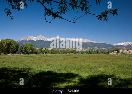 Mount Shavano during early summer featuring Angel of Shavano snow drift in Chaffee County, Colorado. Stock Photo