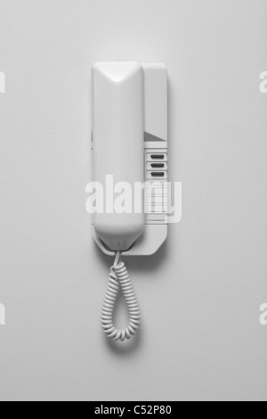 An intercom telephone on a white wall Stock Photo