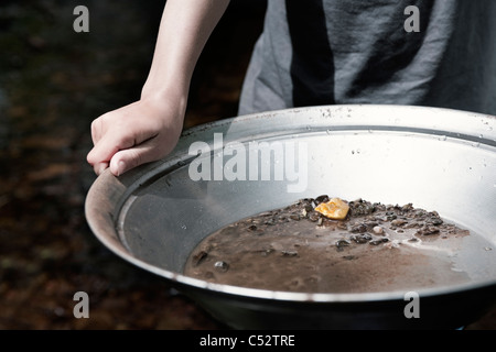 person panning for gold Stock Photo