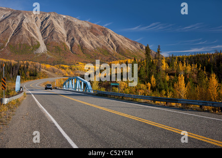 Scenic Autumn view along the Alaska Highway at the Takhanne River Bridge, Yukon Territory, Canada Stock Photo