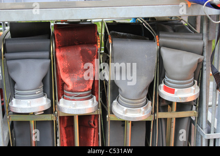Grey and red fire hoses for rescue operations after foods in Copenhagen Stock Photo