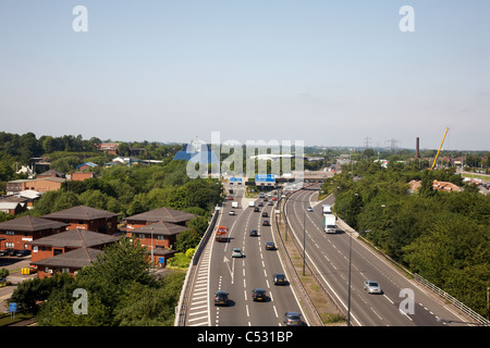 The M60 motorway with Pyramid building as seen from Stockport viaduct Stock Photo