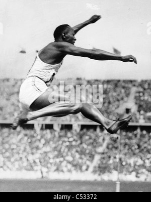 JAMES 'JESSIE' OWENS (1913-1980) American athlete at the 1936 Summer Olympic Games where he won four gold medals Stock Photo