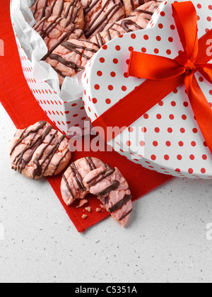 Strawberry cookies dipped in chocolate Stock Photo