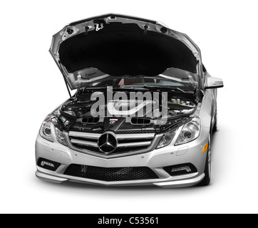 2011 Mercedes-Benz E350 Coupe with open hood isolated on white background with clipping path. Luxury car service concept.