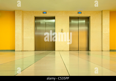 Two elevator doors in a luxurious building Stock Photo