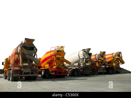 Five Cement Trucks.Isolated on white background Stock Photo