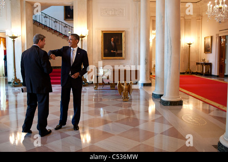 President Barack Obama talks with Rep. Bill Huizenga, R-Mich., in the Grand Foyer of the White House following a meeting with th Stock Photo