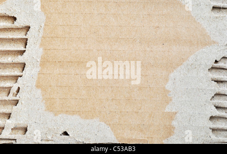 Torn cardboard scrap used as a background Stock Photo