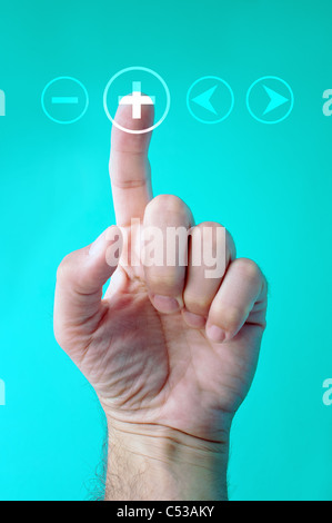 Male hand is pressing a Volume touchscreen button Stock Photo
