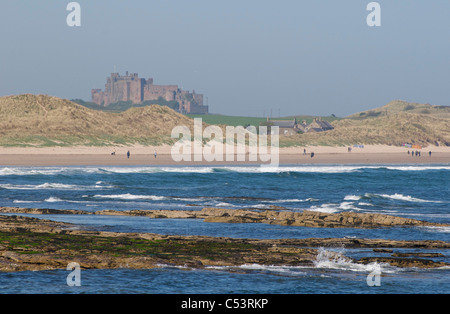 Bamburgh Castle on the Northumberland coastline photographed from Seahouses. Stock Photo