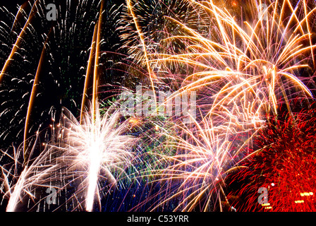 Digital collage of multiple fireworks detonations against the night sky. Stock Photo