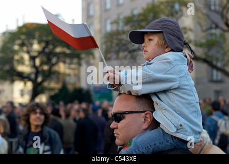 A little girl with a Polish flag on the Independence Day, Katowice, Poland Stock Photo