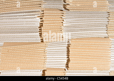 Stack of un-made cardboard cartons Stock Photo