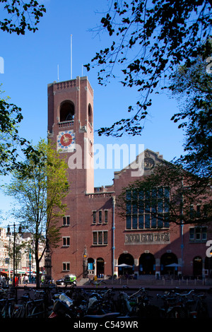 The Netherlands, Amsterdam, Former stock exchange building called Beurs van Berlage. bicycle Stock Photo