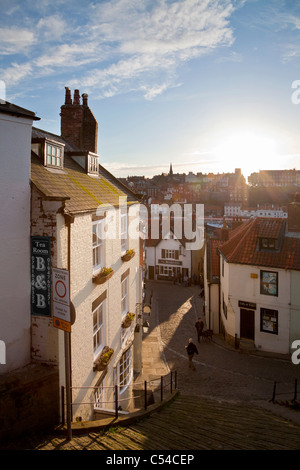 sunset over church lane and Henrietta street, Whitby, North Yorkshire. Stock Photo