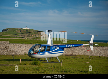 Robinson R44 Raven II Helicopter at Sumburgh, Shetland Isles. SCO 7548 Stock Photo