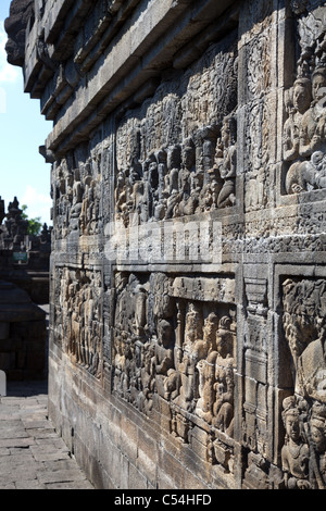 Ancient stone carvings Borobudur temple located close to Jogjakarta in Java Indonesia Stock Photo