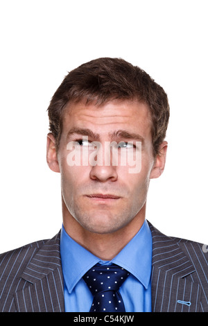 Photo of a businessman with a puzzled expression on his face, headshot isolated on a white background. Part of a series. Stock Photo