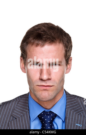 Photo of a businessman with an angry expression on his face, headshot isolated on a white background. Part of a series. Stock Photo