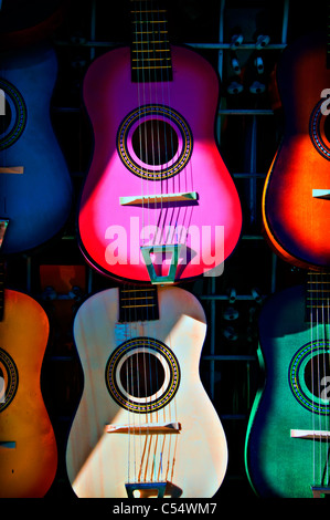 Colorful guitars at a market stall, New Mexico State Fair, Albuquerque, New Mexico, USA Stock Photo