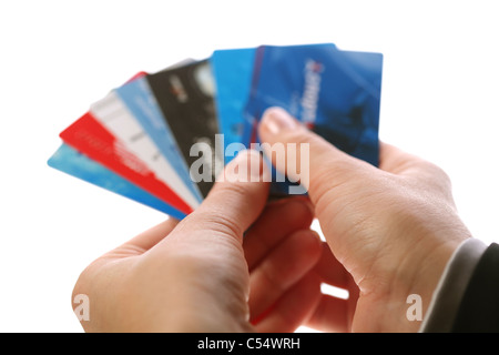 Cards in woman hands isolated on a white background. Stock Photo