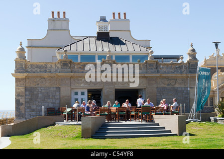 Cafe with people sitting outside on Knightstone Island Weston Super Mare Stock Photo