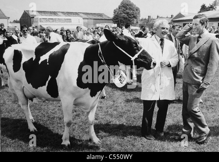 Prince Charles shares a joke with a cattle farmer during a visit to the South Of England Show at Ardingly Showground 1980s Stock Photo