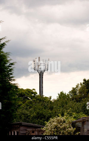 Mobile phone mast in the countryside Stock Photo
