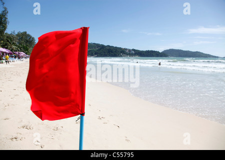 No swimming red flag flying on Patong Beach, Phuket, Thailand Stock Photo