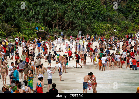 Crowds of people and tourists on the beach Maya Bay where The Beach was filmed, Ko Phi Phi Ley, Phuket, Thailand