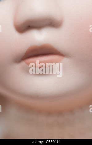 Mouth of a plastic doll Stock Photo