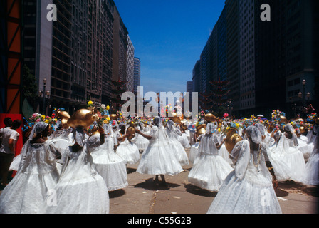 Brazil, Rio De Janeiro, Women dancing in street during carnival Stock Photo