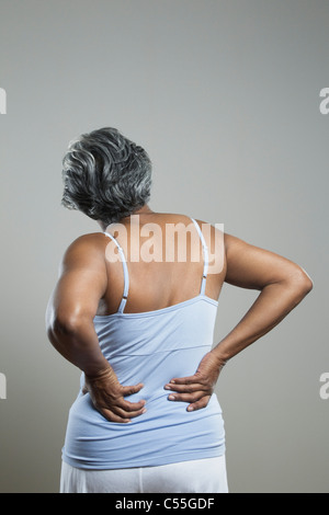 Senior woman suffering from backache Stock Photo