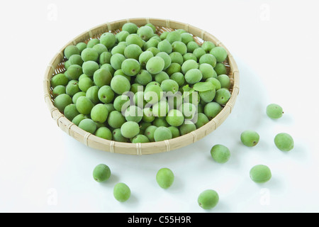 japanese apricots in basket Stock Photo