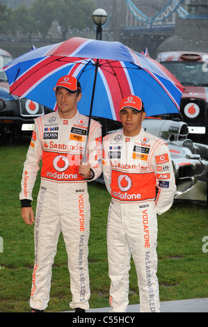 JENSON BUTTON & LEWIS HAMILTON VODAFONE MCLAREN MERCEDES PHOTO CALL POTTERSFIELDS LONDON ENGLAND 07 July 2011 Stock Photo