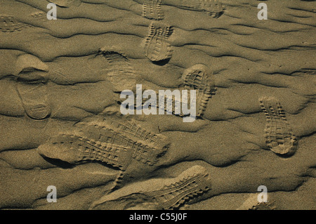 Shoe prints are marked on sandy desert dune Stock Photo